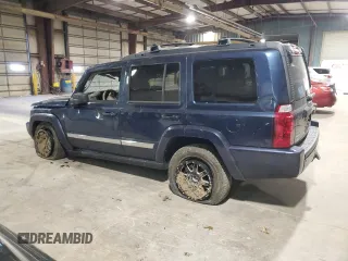 2010 Jeep Commander Sport with VIN 1J4RG4GT7AC113206, listed as a Copart auction lot 56103825 with 174,306 mi miles and Salvage title. Bid and sale history available at DreamBid. Image 2.