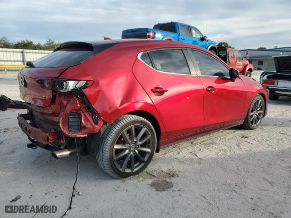 2019 Mazda Mazda3 Hatchback w/Preferred Pkg with VIN JM1BPAMM2K1141639, listed as a Copart auction lot 87246204 with 105,868 mi miles and Non Repairable. Bid and sale history available at carsss.com. Image 3.