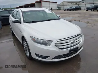 2013 Ford Taurus Limited z VIN 1FAHP2F85DG177024, wystawiony jako IAAI lot #42374078 z przebiegiem 142 291 mil mil oraz . Historia ofert i sprzedaży dostępna na DreamBid. Obrazek 1.