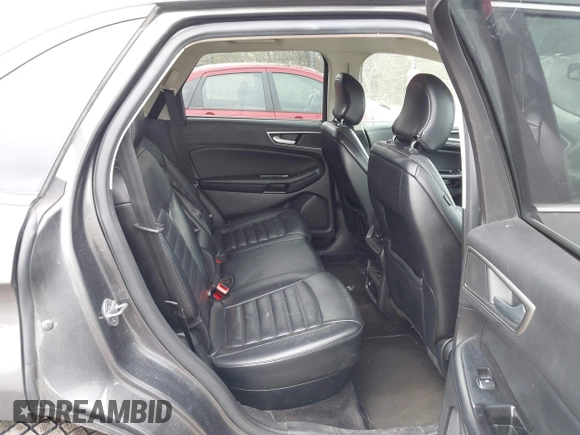 2016 Ford Edge SEL z VIN 2FMPK3J8XGBC40773, wystawiony jako IAAI lot #42129409 z przebiegiem 169 836 mil mil oraz . Historia ofert i sprzedaży dostępna na DreamBid. Obrazek 8.