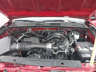 2020 Toyota Tacoma SR5 z VIN 3TMAZ5CN1LM139635, wystawiony jako IAAI lot #40994723 z przebiegiem 72 752 mil mil oraz . Historia ofert i sprzedaży dostępna na DreamBid. Obrazek 10.