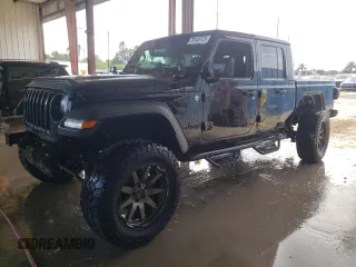 2020 Jeep Gladiator Sport S с VIN 1C6JJTAGXLL139755, выставлен на аукционе Copart как лот 79145173 с пробегом 66 101 миль миль и Списание • Salvage title. История ставок и продаж доступна на DreamBid. Изображение 1.