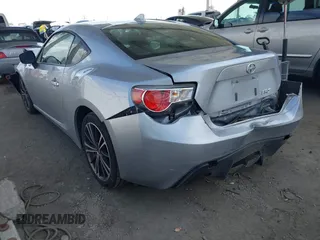 2015 Scion FR-S with VIN JF1ZNAA19F9713270, listed as a IAAI auction lot 42023440 with 79,121 mi miles. Bid and sale history available at carsss.com. Image 3.