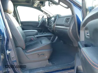 2021 Nissan Titan Pro-4X z VIN 1N6AA1ED1MN517476, wystawiony jako IAAI lot #41422217 z przebiegiem 62 650 mil mil oraz . Historia ofert i sprzedaży dostępna na DreamBid. Obrazek 5.