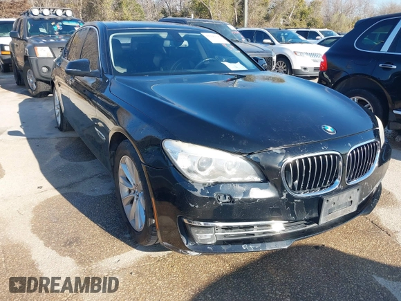 2013 BMW 7 Series 740i with VIN WBAYA6C55DC995094, listed as a IAAI auction lot 41246796 with 164,394 mi miles. Bid and sale history available at carsss.com. Image 1.