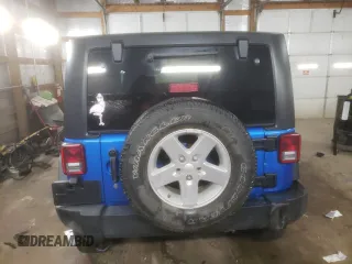 2015 Jeep Wrangler Willys Wheeler with VIN 1C4AJWAG2FL568130, listed as a Copart auction lot 80682914 with 111,686 mi miles and Salvage title. Bid and sale history available at DreamBid. Image 6.