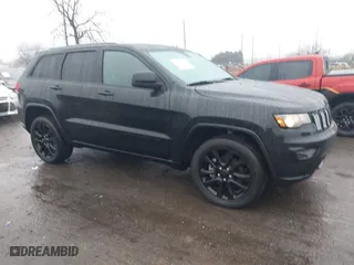 2021 Jeep Grand Cherokee Laredo X with VIN 1C4RJFAG7MC530344, listed as a IAAI auction lot 41115040 with 27,233 mi miles. Bid and sale history available at carsss.com. Image 1.
