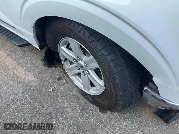2022 Ford F-150 XL with VIN 1FTFW1ED8NFC41240, listed as a IAAI auction lot 42792652 with 46,947 mi miles and . Bid and sale history available at DreamBid. Image 14.