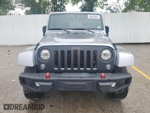 2018 Jeep Wrangler Unlimited Rubicon Recon with VIN 1C4BJWFGXJL814198, listed as a Copart auction lot 59434645 with 43,931 mi miles and Salvage title. Bid and sale history available at DreamBid. Image 5.
