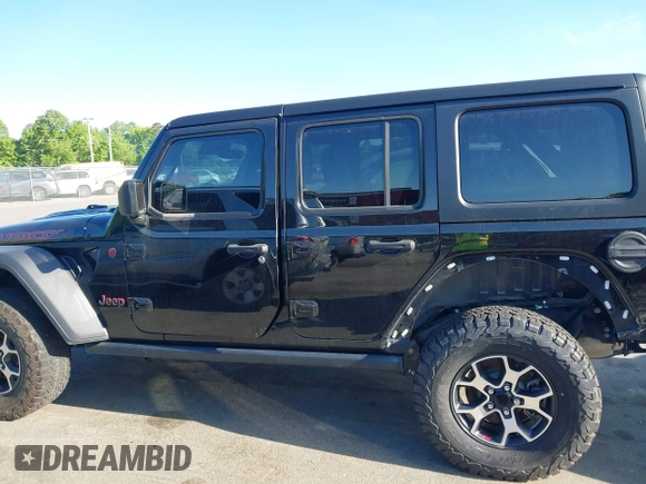 2022 Jeep Wrangler Unlimited Rubicon with VIN 1C4HJXFNXNW149063, listed as a IAAI auction lot 42130171 with 33,961 mi miles and . Bid and sale history available at DreamBid. Image 14.
