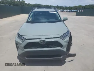 2020 Toyota RAV4 XLE with VIN 2T3W1RFV5LW058717, listed as a Copart auction lot 59592395 with 81,266 mi miles and Salvage title. Bid and sale history available at DreamBid. Image 5.