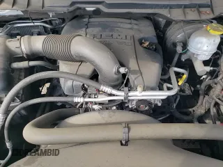 2018 Ram 1500 Tradesman z VIN 3C6JR6DT9JG291605, wystawiony jako Copart lot #51995945 z przebiegiem 83 946 mil mil oraz Szkoda całkowita • Salvage title. Historia ofert i sprzedaży dostępna na DreamBid. Obrazek 14.