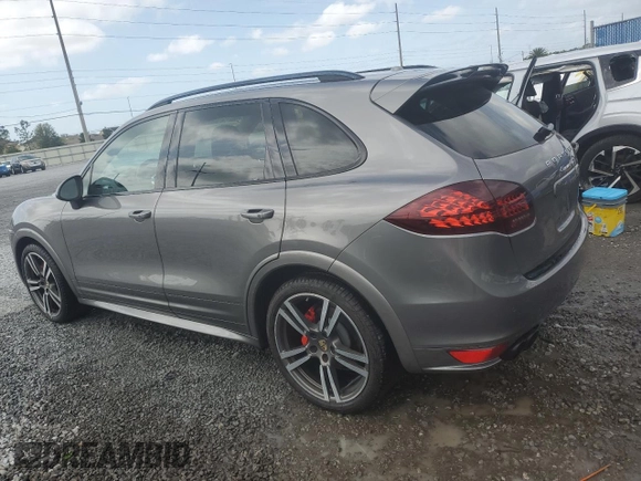 2014 Porsche Cayenne GTS с VIN WP1AD2A22ELA70950, выставлен на аукционе Copart как лот 48324015 с пробегом 75 310 миль миль и На запчасти • Non repairable. История ставок и продаж доступна на DreamBid. Изображение 2.