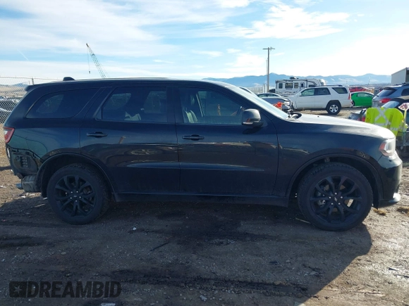 2019 Dodge Durango GT Plus with VIN 1C4RDJDG4KC764623, listed as a IAAI auction lot 41157875 with 62,747 mi miles and . Bid and sale history available at DreamBid. Image 14.