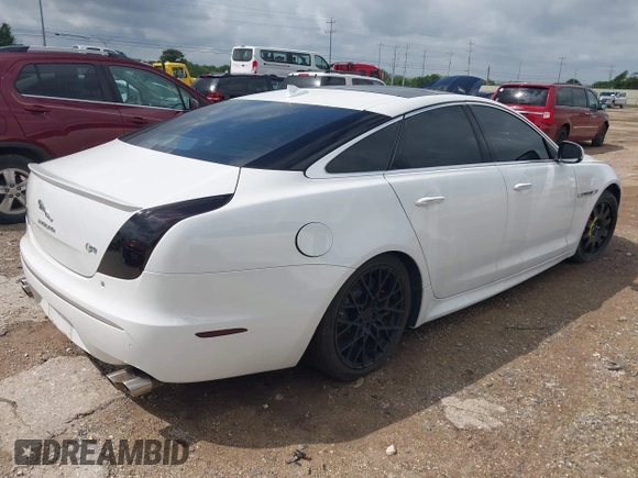 2014 Jaguar XJ R with VIN SAJWA1EK3EMV58692, listed as a IAAI auction lot 42663979 with 111,386 mi miles and . Bid and sale history available at DreamBid. Image 4.