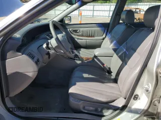 2000 Toyota Avalon XL with VIN 4T1BF28B5YU031947, listed as a Copart auction lot 56239265 with 167,627 mi miles and Salvage title. Bid and sale history available at DreamBid. Image 7.
