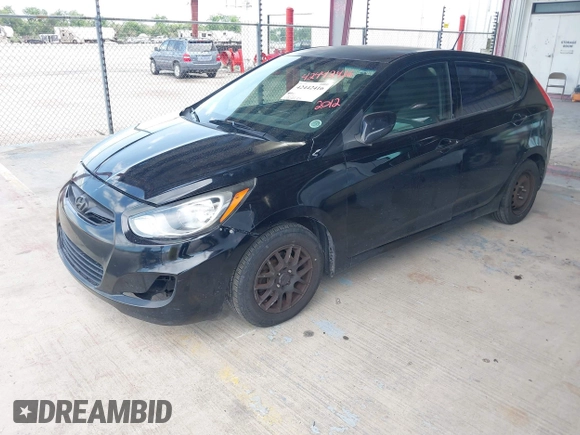2012 Hyundai Accent GS with VIN KMHCT5AE6CU031774, listed as a IAAI auction lot 42442416 with 178,261 mi miles and . Bid and sale history available at DreamBid. Image 2.