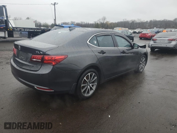 2015 Acura TLX V6 Advance with VIN 19UUB2F74FA023099, listed as a Copart auction lot 48636865 with 74,499 mi miles and Salvage Title. Bid and sale history available at carsss.com. Image 3.