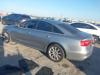 2013 Audi A6 3.0T Prestige with VIN WAUJGAFC6DN131821, listed as a IAAI auction lot 41411463 with 186,380 mi miles. Bid and sale history available at carsss.com. Image 3.
