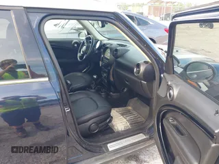 2013 MINI Countryman with VIN WMWZB3C5XDWM31035, listed as a IAAI auction lot 42543943 with 151,209 mi miles and . Bid and sale history available at DreamBid. Image 5.