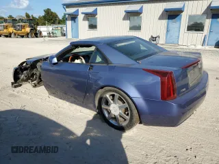 2006 Cadillac XLR z VIN 1G6YV36A065601591, wystawiony jako Copart lot #76537084 z przebiegiem Nie podano mil oraz Tytuł czysty. Historia ofert i sprzedaży dostępna na DreamBid. Obrazek 2.