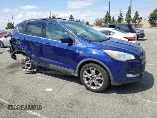 2015 Ford Escape SE with VIN 1FMCU0GX0FUC12849, listed as a Copart auction lot 54771305 with 90,287 mi miles and Salvage Title. Bid and sale history available at carsss.com. Image 4.