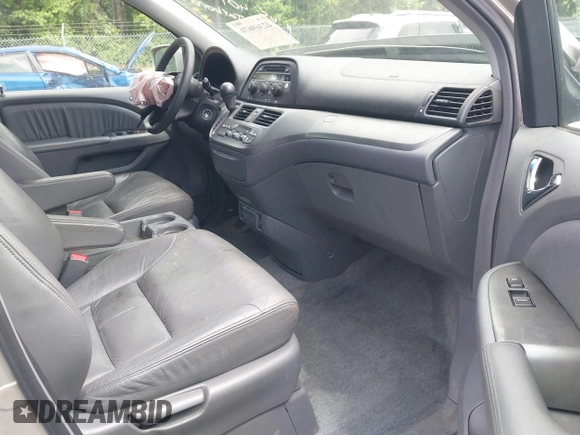 2005 Honda Odyssey EX-L z VIN 5FNRL38695B036836, wystawiony jako IAAI lot #42369670 z przebiegiem 222 061 mil mil oraz . Historia ofert i sprzedaży dostępna na DreamBid. Obrazek 5.