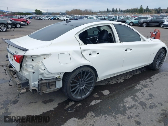 2014 Infiniti Q50 Premium z VIN JN1BV7AP8EM671403, wystawiony jako IAAI lot #41837716 z przebiegiem 115 058 mil mil oraz . Historia ofert i sprzedaży dostępna na DreamBid. Obrazek 4.