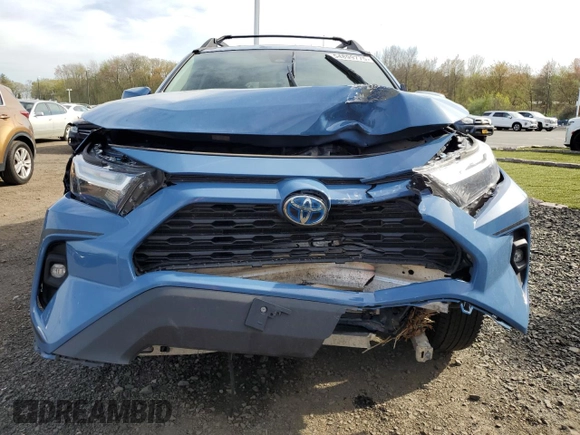 2023 Toyota RAV4 Hybrid XLE with VIN 2T3UWRFV1PW151099, listed as a Copart auction lot 54899775 with 83,437 mi miles and Salvage title. Bid and sale history available at DreamBid. Image 5.