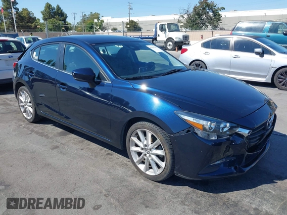 2017 Mazda 3 Touring with VIN 3MZBN1L77HM140562, listed as a IAAI auction lot 42761296 with 76,987 mi miles and . Bid and sale history available at DreamBid. Image 1.