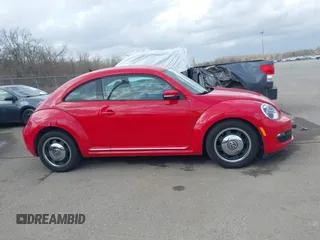 2012 Volkswagen Beetle 2.5L PZEV with VIN 3VWJP7AT4CM608099, listed as a IAAI auction lot 41566505 with 130,189 mi miles. Bid and sale history available at carsss.com. Image 13.