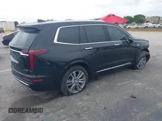 2023 Cadillac XT6 FWD Premium Luxury with VIN 1GYKPCRS6PZ106284, listed as a IAAI auction lot 41595617 with 32,795 mi miles and . Bid and sale history available at DreamBid. Image 4.