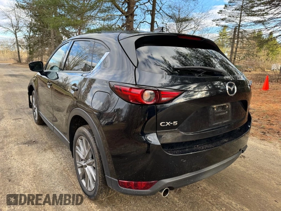 2020 Mazda CX-5 Grand Touring with VIN JM3KFADM8L0785373, listed as a Copart auction lot 50829175 with 135,736 mi miles and Clean Title. Bid and sale history available at DreamBid. Image 3.