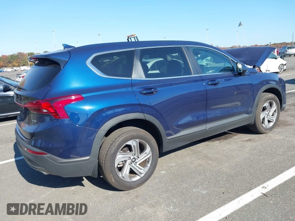 2023 Hyundai Santa Fe SE z VIN 5NMS1DAJ0PH552080, wystawiony jako IAAI lot #40653004 z przebiegiem 5 982 mil mil oraz . Historia ofert i sprzedaży dostępna na DreamBid. Obrazek 4.