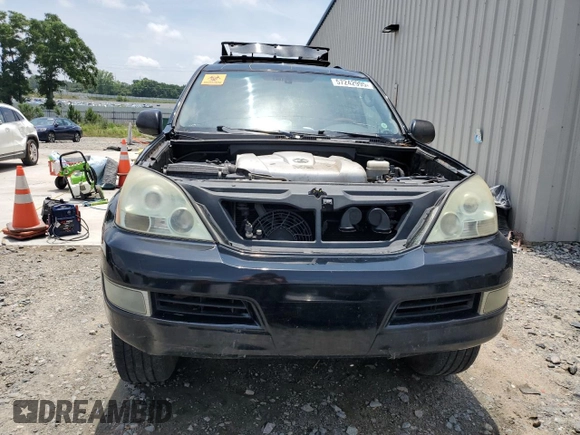 2006 Lexus GX 470 z VIN JTJBT20X660101641, wystawiony jako Copart lot #57242995 z przebiegiem 219 032 mil mil oraz Szkoda całkowita • Salvage title. Historia ofert i sprzedaży dostępna na DreamBid. Obrazek 5.
