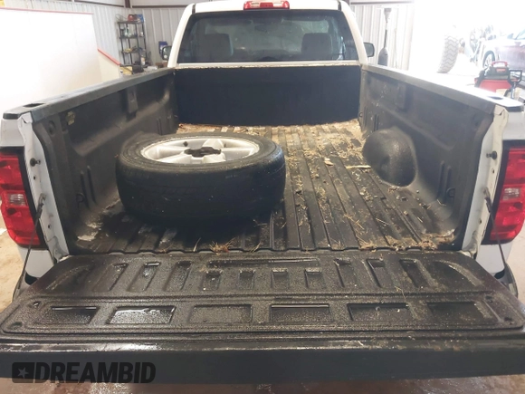 2014 Chevrolet Silverado 1500 Work Truck with VIN 1GCNKPEH5EZ266821, listed as a IAAI auction lot 41570036 with 125,916 mi miles and . Bid and sale history available at DreamBid. Image 8.