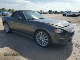 2017 FIAT 124 Spider Lusso z VIN JC1NFAEK7H0123436, wystawiony jako Copart lot #56169965 z przebiegiem 133 320 mil mil oraz Czysty tytuł • Clean title. Historia ofert i sprzedaży dostępna na DreamBid. Obrazek 4.