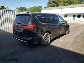 2023 Chrysler Pacifica Hybrid Touring L with VIN 2C4RC1L7XPR592181, listed as a Copart auction lot 52144505 with 45,770 mi miles and Salvage Title. Bid and sale history available at carsss.com. Image 3.