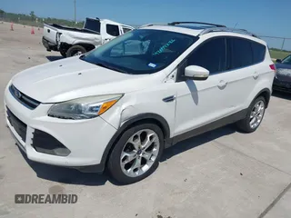 2013 Ford Escape Titanium with VIN 1FMCU0J9XDUA33872, listed as a IAAI auction lot 42009286 with 161,677 mi miles. Bid and sale history available at carsss.com. Image 2.
