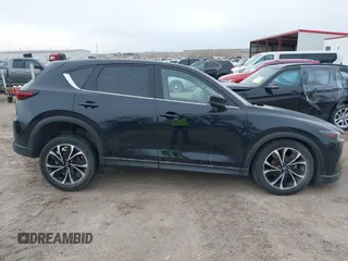 2023 Mazda CX-5 S Premium with VIN JM3KFBDM2P0221973, listed as a IAAI auction lot 41853756 with Not Provided miles and . Bid and sale history available at DreamBid. Image 14.