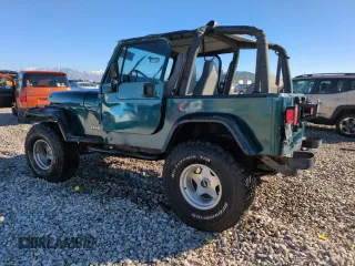 1995 Jeep Wrangler S with VIN 1J4FY19PXSP252139, listed as a Copart auction lot 79447894 with 93,263 mi miles and Salvage Title. Bid and sale history available at carsss.com. Image 2.