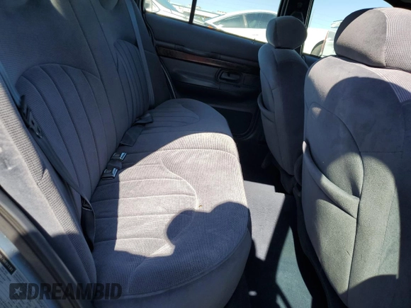 1999 Mercury Grand Marquis GS z VIN 2MEFM74W5XX711421, wystawiony jako Copart lot #53062605 z przebiegiem 106 913 mil mil oraz Nie do naprawy • Non repairable. Historia ofert i sprzedaży dostępna na DreamBid. Obrazek 10.