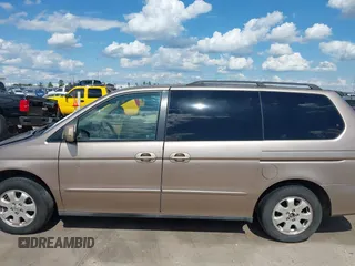 2003 Honda Odyssey EX-L z VIN 5FNRL18993B116892, wystawiony jako IAAI lot #42241908 z przebiegiem 276 223 mil mil oraz . Historia ofert i sprzedaży dostępna na DreamBid. Obrazek 15.