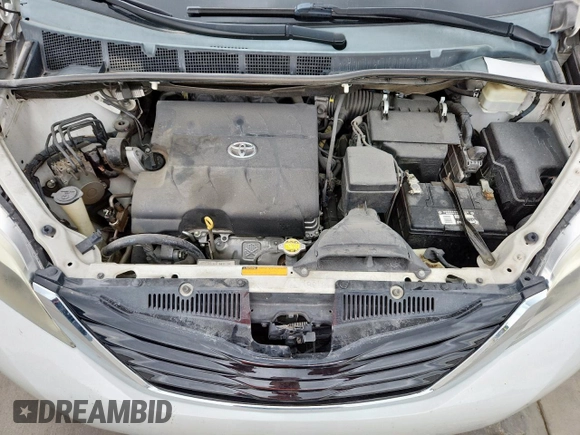 2015 Toyota Sienna XLE with VIN 5TDYK3DC4FS617099, listed as a Copart auction lot 61128025 with 114,508 mi miles and Salvage title. Bid and sale history available at DreamBid. Image 12.