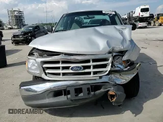 1999 Ford F-150 with VIN 1FTZX1729XNB67194, listed as a Copart auction lot 58383345 with Not provided miles and Salvage title. Bid and sale history available at DreamBid. Image 13.