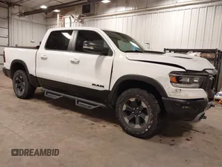 2019 Ram 1500 Rebel with VIN 1C6SRFLT3KN897707, listed as a IAAI auction lot 42635799 with 57,204 mi miles and . Bid and sale history available at DreamBid. Image 1.