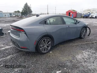 2024 Toyota Prius LE z VIN JTDADABU4R3015000, wystawiony jako IAAI lot #41147221 z przebiegiem 4 411 mil mil oraz . Historia ofert i sprzedaży dostępna na DreamBid. Obrazek 4.