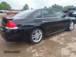 2014 Chevrolet Impala LTZ with VIN 2G1WC5E36E1138809, listed as a IAAI auction lot 41961255 with 119,222 mi miles and . Bid and sale history available at DreamBid. Image 4.