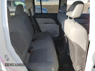 2007 Jeep Patriot Sport with VIN 1J8FF28WX7D355881, listed as a Copart auction lot 82766473 with 120,519 mi miles and Salvage Title. Bid and sale history available at DreamBid. Image 11.