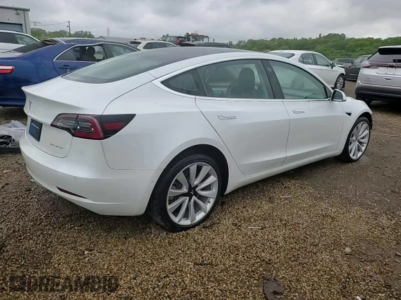 2020 Tesla Model 3 Long Range z VIN 5YJ3E1EB3LF667522, wystawiony jako Copart lot #57421145 z przebiegiem 77 821 mil mil oraz Szkoda całkowita • Salvage title. Historia ofert i sprzedaży dostępna na DreamBid. Obrazek 14.